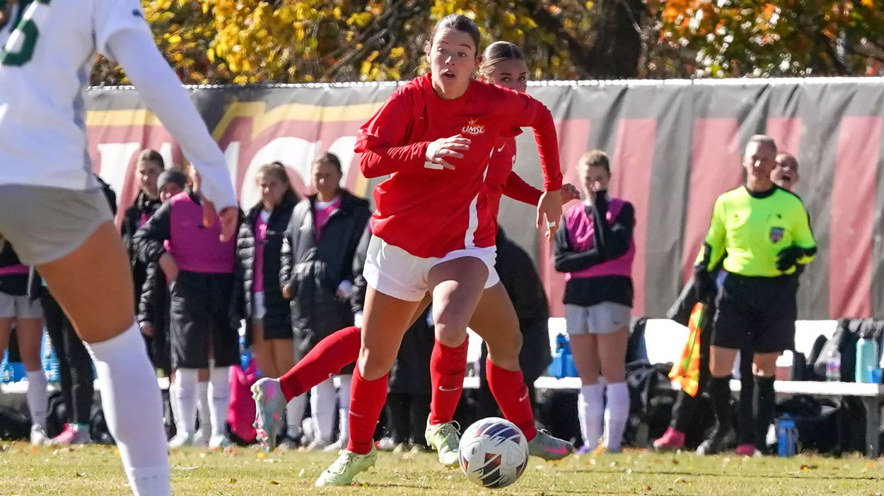 Maddie Clark dribbles a soccer ball in a recent match