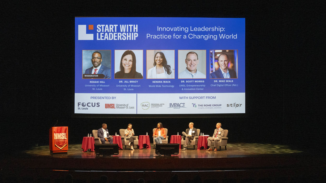 Vice Chancellor Reggie Hill (at left) moderates a panel discussion during the Start with Leadership Conference in the Blanche M. Touhill Performing Arts Center