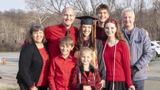 Sarah Wirthlin surrounded by her family after Saturday afternoon's commencement ceremony