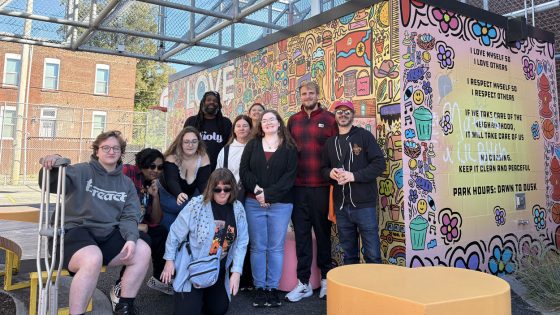 "St. Louis: Hope in Action" students at a neighborhood park built by community members on a formerly vacant lot along Cherokee Street
