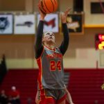 Women's basketball player Morgan Ramthun shoots near the basket