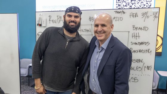 Junior finance major D.J. Pujji and American University faculty member Steven Shapiro