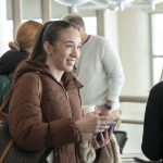 Freshman computer science major Viktoria Dimitrova talks to Teaching Professor Jennifer Siciliani about an upcoming study abroad trip she's leading to Greece during the annual Study Abroad Fair.