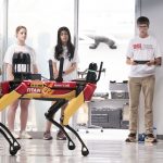 Area high school students take turns controlling Titan, UMSL's robotic dog, at the UMSL Geospatial Summer Camp in June 2025.