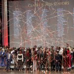 Streamers fall on members of the Bridge Program's 2026 senior class during the annual Saturday Academy Award Recognition Ceremony