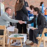 J.R. Maxfield, Assistant Vice President, Talent Acquisition with Safety National, speaks with UMSL junior computer major, Jeremy Ringkamp