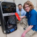 Hamid Sanei and Harlan Sigler using 3D printer