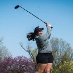 Mayan Covarrubias follows through after a tee shot