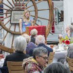 Sophie Steinmetz talks about the impact scholarships have had on her college experience at a luncheon for members of the 1963 Society in the St. Louis Mercantile Library atrium