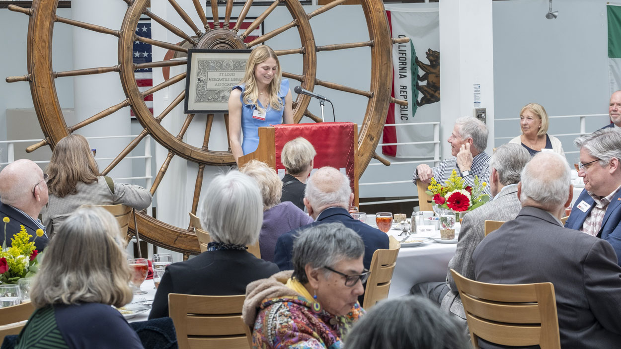 Sophie Steinmetz talks about the impact scholarships have had on her college experience at a luncheon for members of the 1963 Society in the St. Louis Mercantile Library atrium