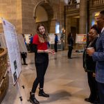 Biology major Zoe Ellis discusses her research on livebearing fish with Representative Marla Smith and Senator Brian Williams on March 12 at Undergraduate Research Day at the Missouri Capitol