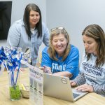 (From left) St. Louis Children's Advocacy Center Director of Forensic Services and Community Engagement Amy Robins, Executive Director Jerry Dunn and Deputy Director Megan Marietta
