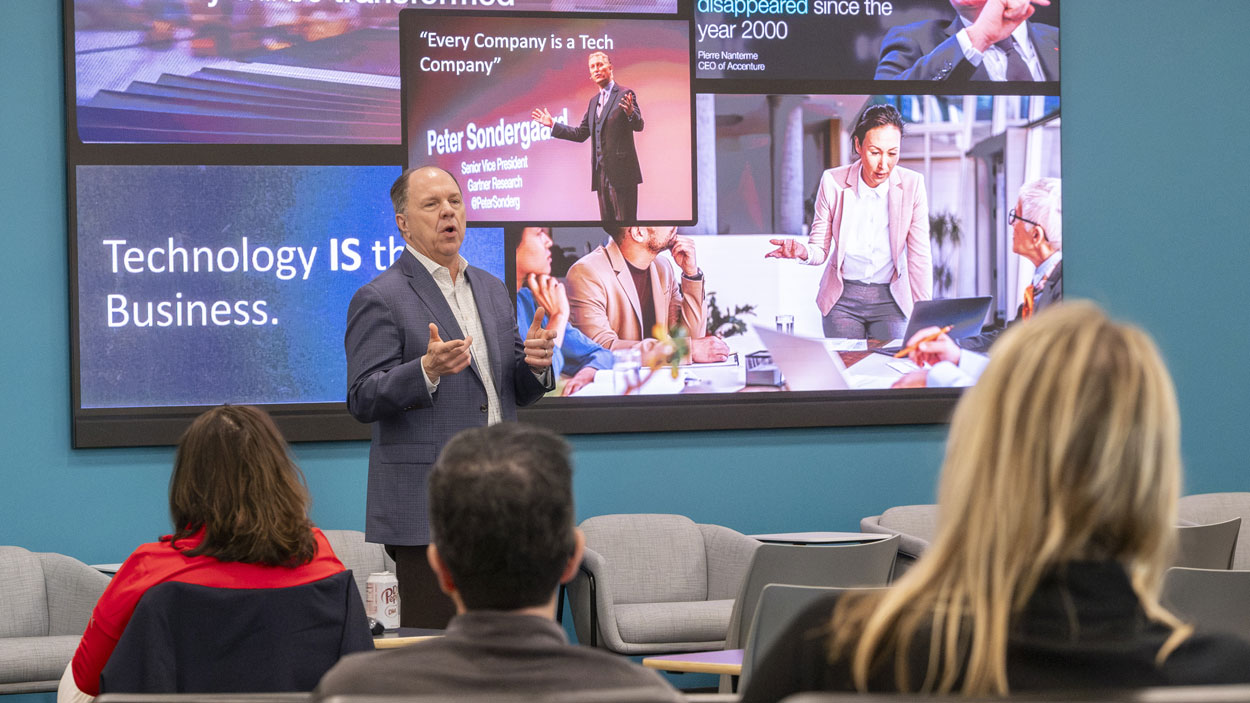 Michael Seals delivers a lightning talk to fellow alums of the Doctor of Business Administration Program at the University of Missouri–St. Louis on April 3 in the UMSL Innovation Center as part of an Alumni Weekend for graduates of the DBA program.