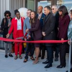 DOORWAYS CEO and UMSL alum Opal Jones cuts the ribbon during a ceremony to open the Jefferson Avenue Campus in October 2022