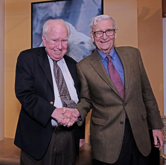 Peter Raven shakes hands with biologist E.O. Wilson at the World Ecology Award Gala in 2018