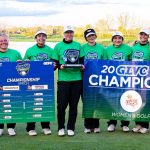 Members of the UMSL women's golf team hold up banners and a trophy after winning the Great Lakes Valley Conference Championship for the first time in school history on Sunday at Rock Hollow Golf Club in Peru, Indiana.