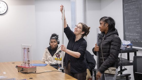 Sonya Bahar works with students during the Bridge Program's Saturday Academy