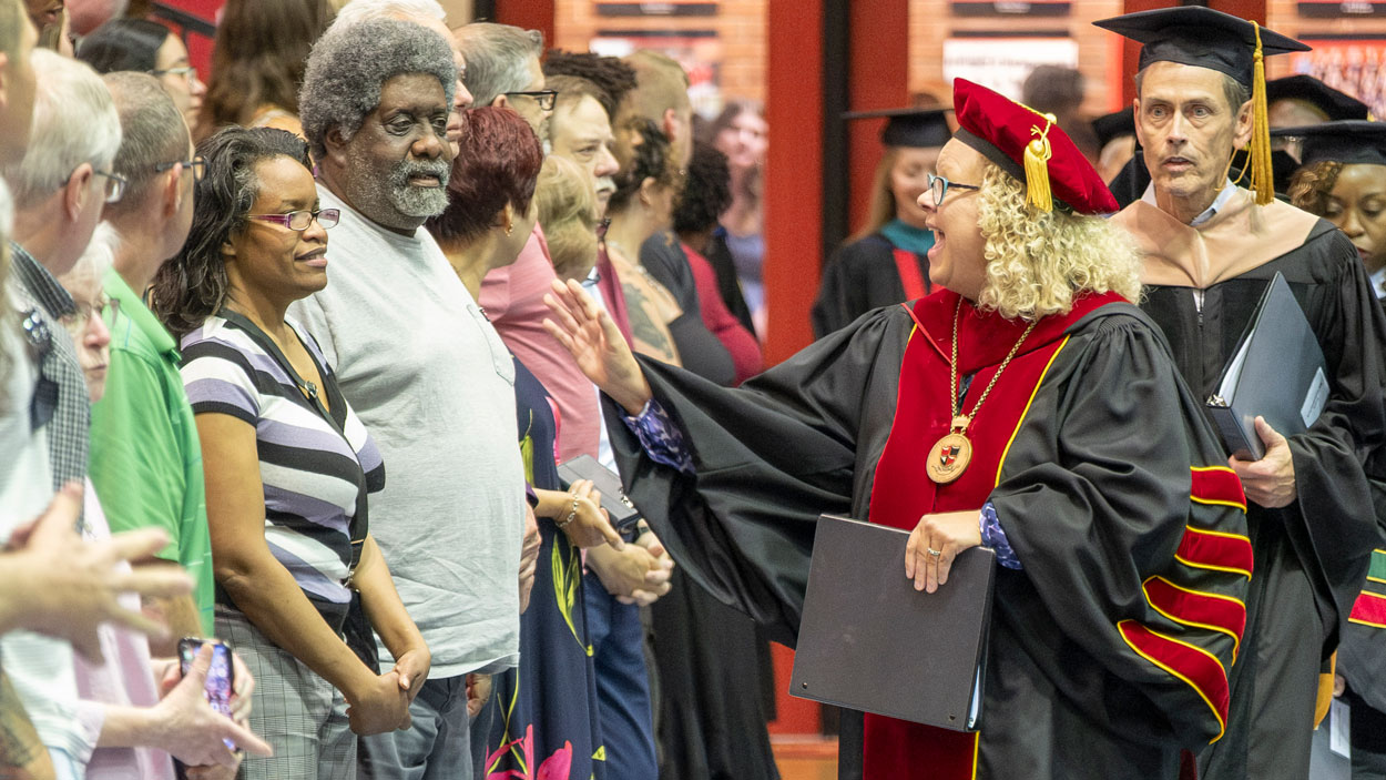Chancellor Kristin Sobolik greets the crowd during UMSL's spring 2026 commencement. This year marked the final commencement for Sobolik before she steps down from her position on July 1.
