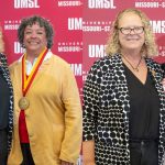 Chancellor Kristin Sobolik presents Chancellor's Medals to Adella Jones and Channon Peoples