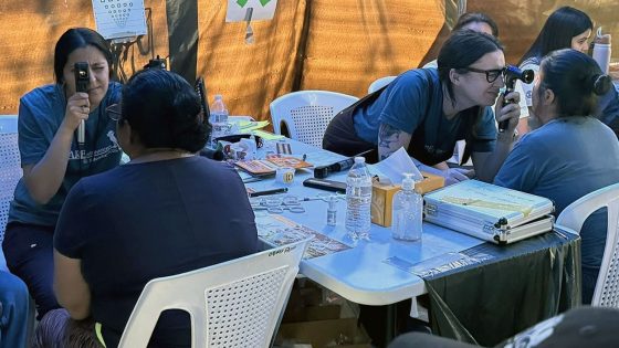 Devansi Patel and Kiley Stout perform retinoscopy on patients during an I Care clinic in El Salvador 
