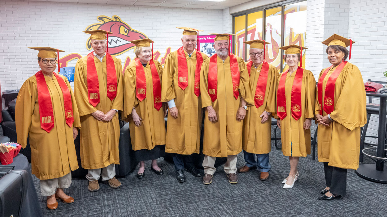 UMSL Golden Graduates pose for a photo before the start of the fourth commencement ceremony. Golden Grads are alumni who graduated 50 or more years ago and continue to shape and inspire the Triton community.