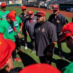 Coach Scott Eul addresses members of the UMSL baseball team after they won the Great Lakes Valley Conference championship on Saturday in Marion, Illinois. (Photo courtesy of UMSL Athletics)