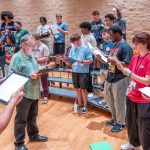 Jim Henry works with high school students