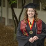 Allison Lendman wearing cap and gown