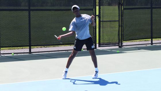 Anthony Burrows prepares to hit a forehand