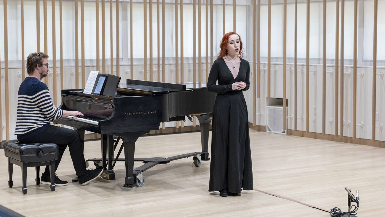 Archer McGrosso, an undergraduate student in the College of Arts and Sciences, sings "Sorry Her Lot" from W.S. Gilbert and Arthur Sullivan's comic opera "H.M.S. Pinafore" on May 6 during the Spring Vocal Recital in the Creative Arts Building's Arianna String Quartet Recital Hall.