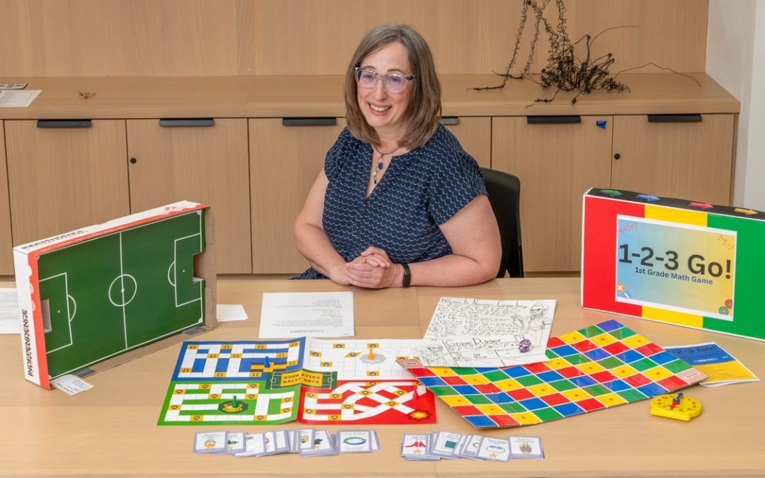 Teaching Professor Maureen Quigley developing historical card game