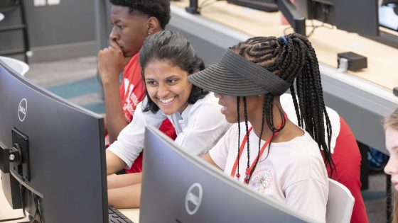 Assistant Teaching Professor Gizella Cota working with students in the UMSL Geospatial Summer Camp