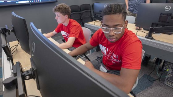 SLUH student Nick Schultz and CBC student Ethan Williams in UMSL Geospatial Advanced Technology Lab