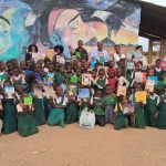 Tchule Moore with students in Malawi
