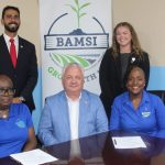 Provost Steven J. Berberich (center) flanked by (from left) Sherese Cunningham, BAMSI's Registrar and Manager of Student Support Services; Matheus Costa de Assis, UMSL's Associate Director of International Recruitment; Jill Bockhorst, UMSL's project manager for strategic partnerships; and BAMSI President Ravennia Roberts-Hanna.