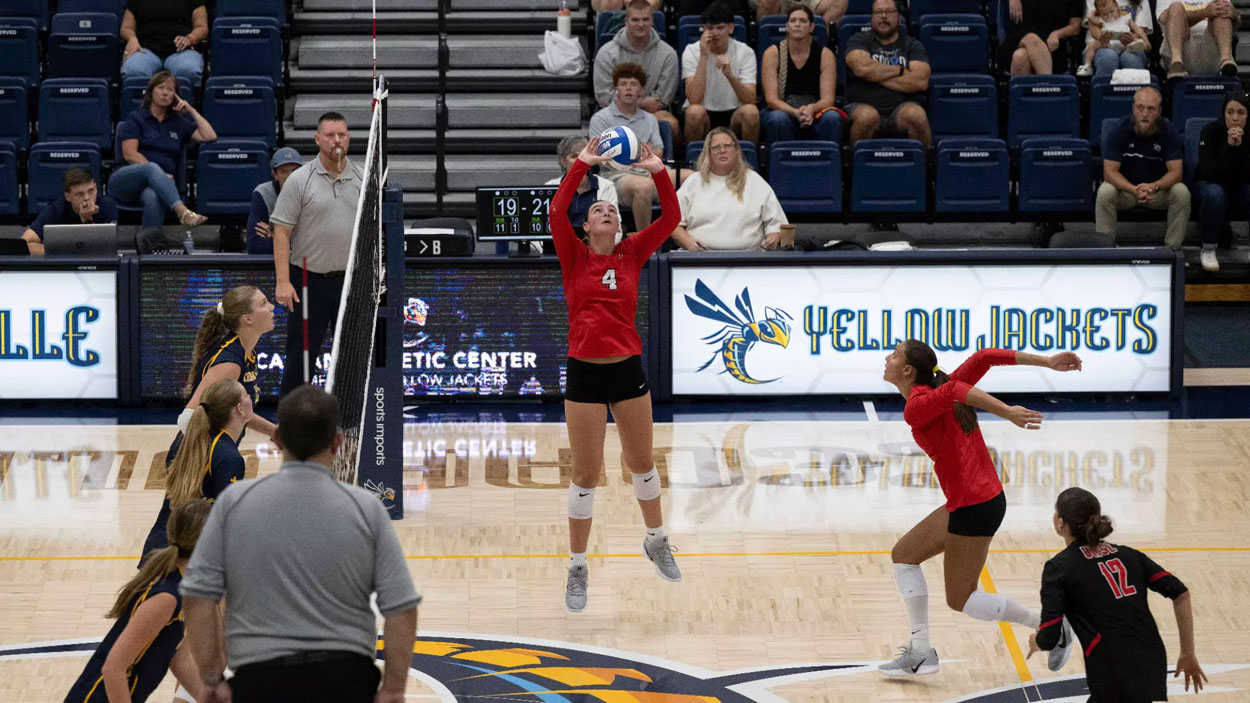 UMSL setter Marly Burbach prepares to deliver a pass to one of her teammates