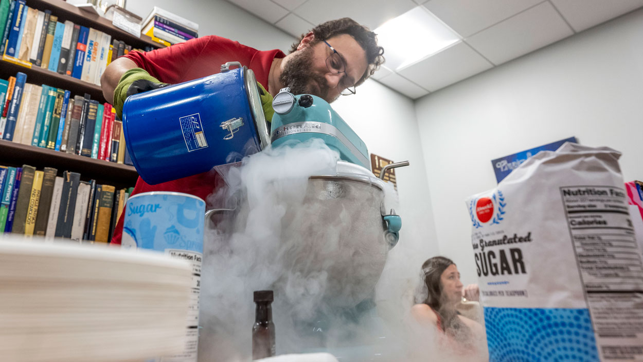 University of Missouri–St. Louis Physics and Astronomy Club president Jesse Bier uses liquid nitrogen to make ice cream for the group during a recent club meeting.