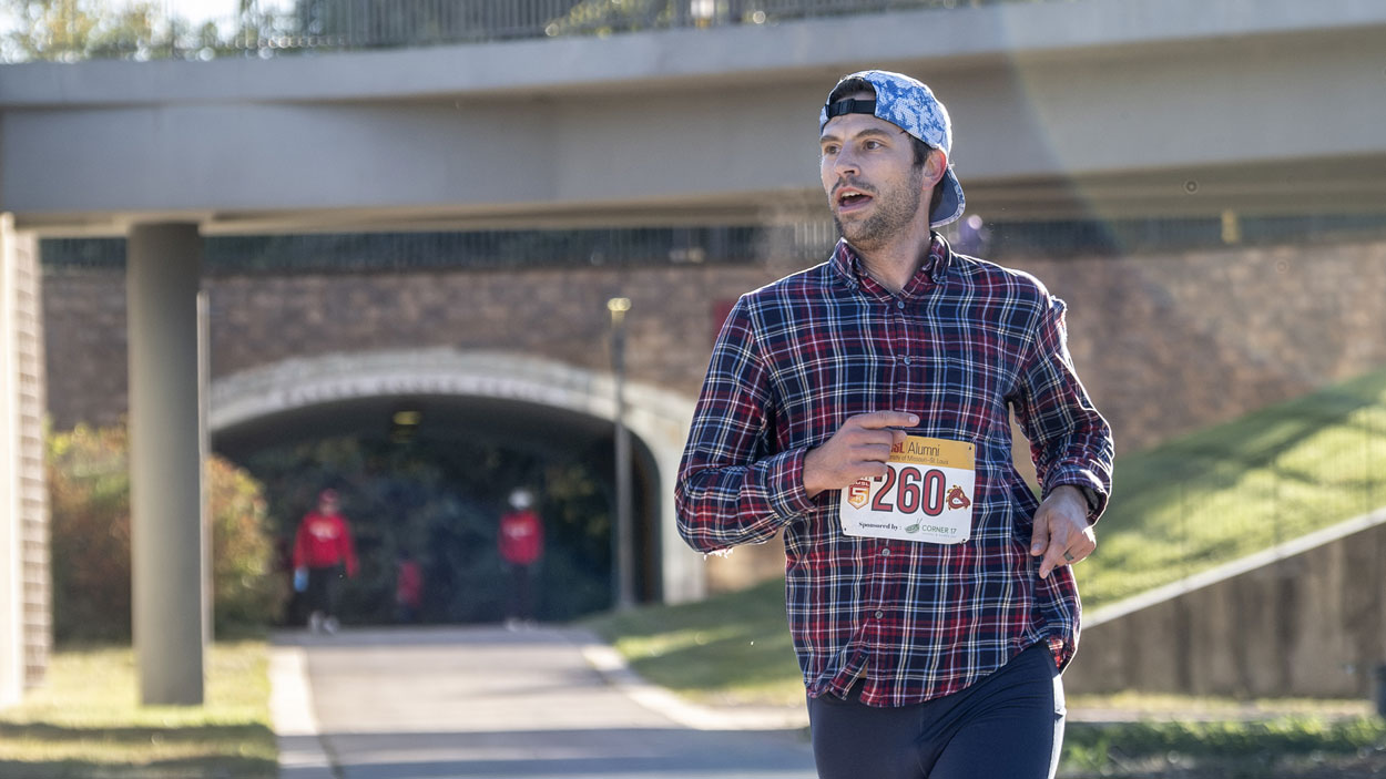 Race winner John Spencer runs along the St. Vincent Greenway near the Recreation and Wellness Center during the UMSL 5K Run/Walk